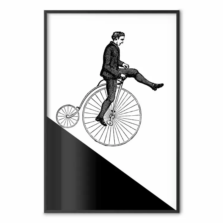 Cyklista - czarno-biała kompozycja z mężczyzną na jednokołowym rowerze
