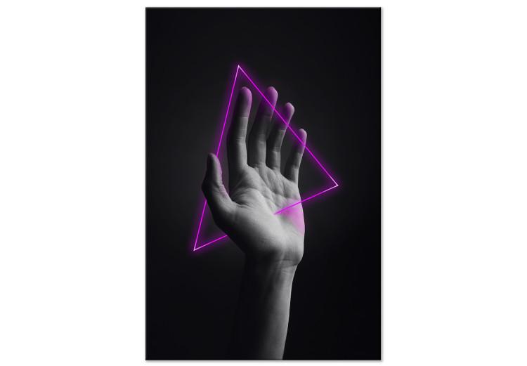Obraz na płótnie Trójkąt w ręce - kompozycja z neonową figurą w dłoni na czarnym tle