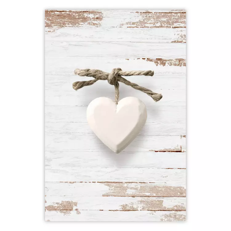 Zasupłana miłość - kamienne białe serduszko na jasnym drewnianym tle
