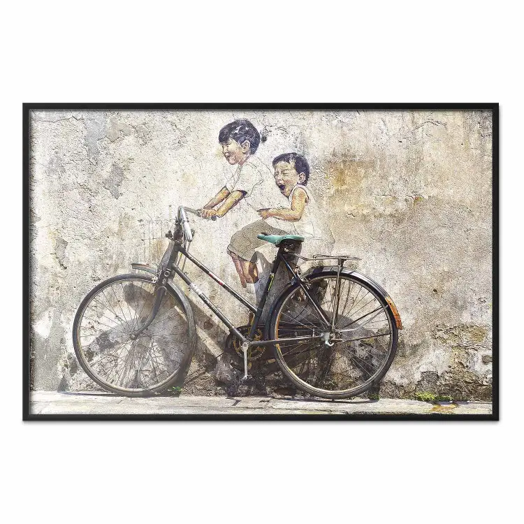 Beztroska - retro czarny rower na tle ściany z namalowanymi dziećmi