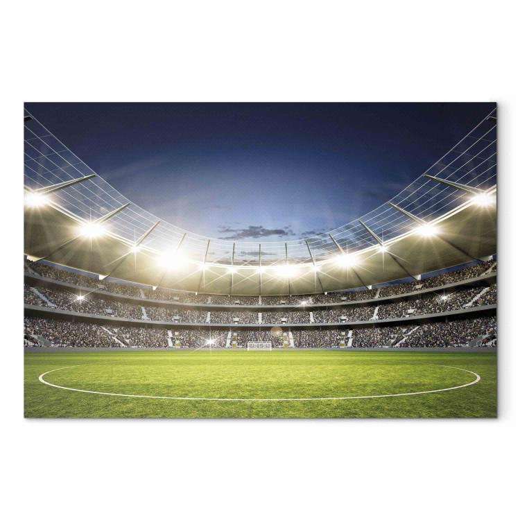 Obraz na płótnie Stadion piłkarski - oświetlona murawa i trybuny przed finałowym meczem
