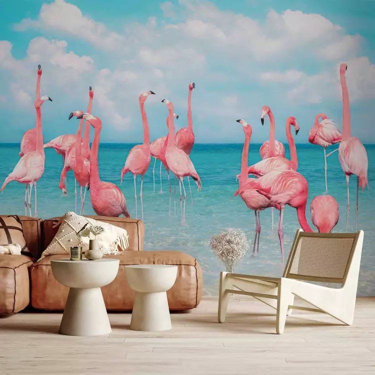 Stado flamingów - różowe ptaki w krystalicznie czystej wodzie