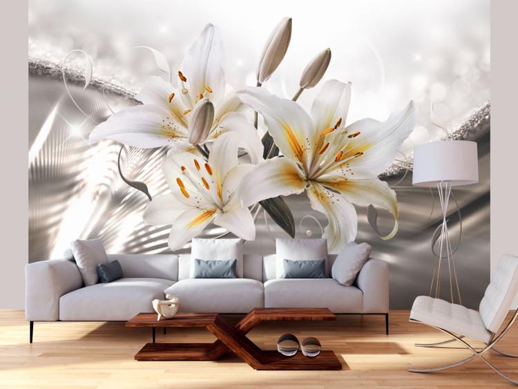 Fototapeta Piękno lilii - białe kwiaty na srebrnym tle z efektem blasku światła