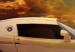 Fototapeta Demon prędkości - zdjęcie sportowego auta na tle pochmurnego nieba 144541 additionalThumb 3