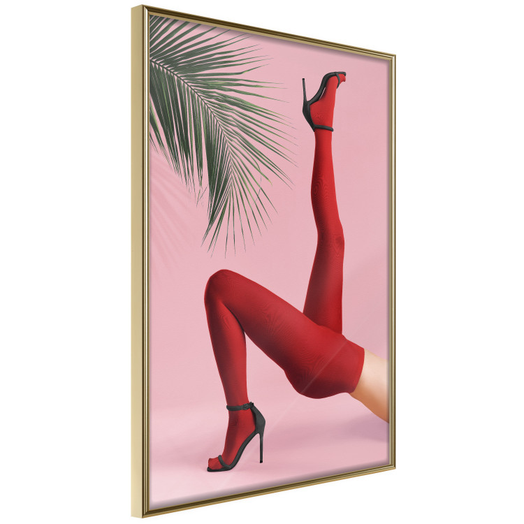 Plakat Czerwone rajstopy - kobiecie nogi, szpilki i liść palmy na różowym tle 144125 additionalImage 7