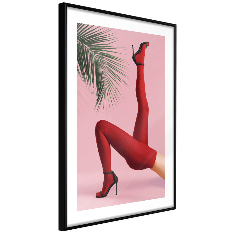 Plakat Czerwone rajstopy - kobiecie nogi, szpilki i liść palmy na różowym tle 144125 additionalImage 5