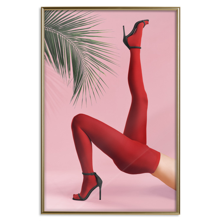 Plakat Czerwone rajstopy - kobiecie nogi, szpilki i liść palmy na różowym tle 144125 additionalImage 27