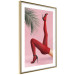 Plakat Czerwone rajstopy - kobiecie nogi, szpilki i liść palmy na różowym tle 144125 additionalThumb 10