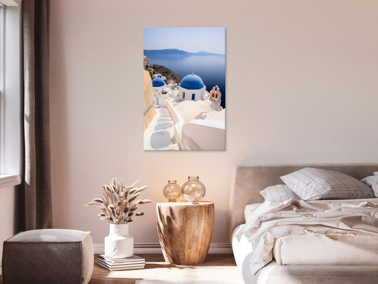Obraz Słoneczny pejzaż Santorini - krajobraz z morzem i architekturą grecką 136077 additionalImage 3