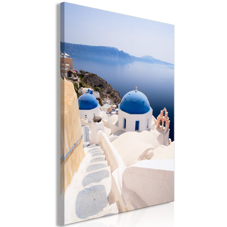 Obraz Słoneczny pejzaż Santorini - krajobraz z morzem i architekturą grecką 136077 additionalImage 2