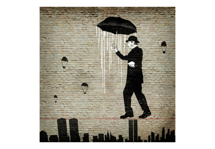 Fototapeta Charlie Chaplin - mural z sylwetką mężczyzny z parasolem na linie 60748 additionalImage 1